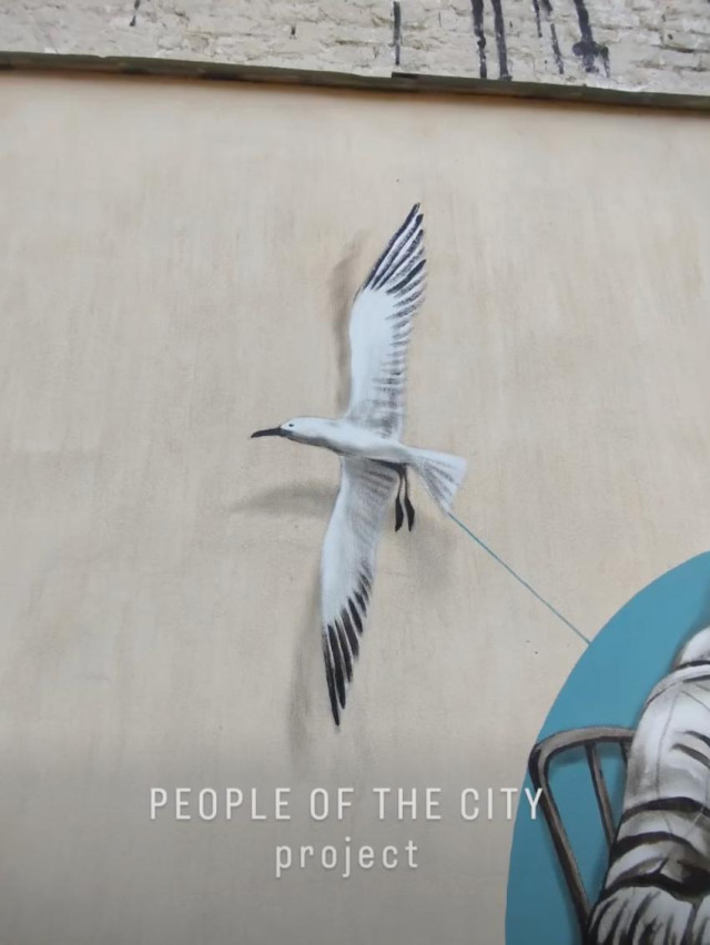 У Луцьку з’явився новий мурал із вуличним музикантом Сергієм Васевичем