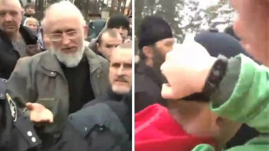 Священник московського патріархату вдарив по голові хлопчика із прапором України